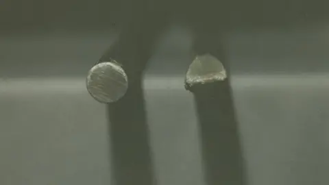 South Wales Police The end of the metal pole which was identified as the murder weapon