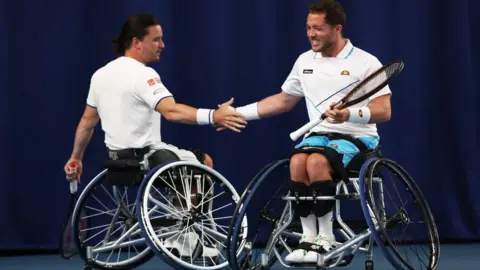 Alfie Hewett and Gordon Reid shake hands