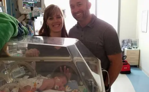 Adam Winch Melissa and Adam Winch with Axle