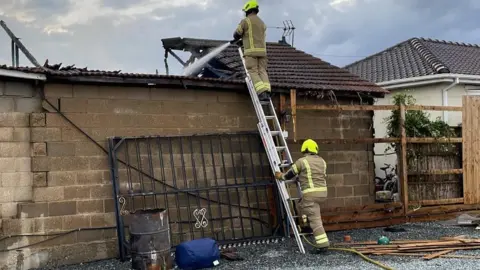 Essex Fire Service Bungalow fire being extinguished by fire crews