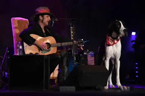 Getty Images Travis McCready on stage