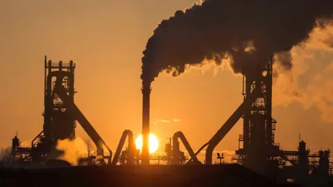 Getty Images The sun rises above the Scunthorpe steelworks