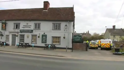 Police at the King's Head pub in Great Cornard