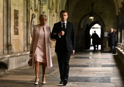 Getty Images French President Emmanuel Macron and wife Brigitte Macron