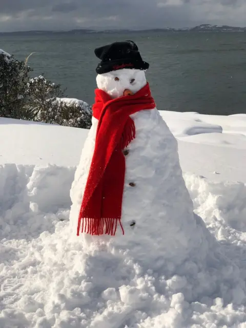Stephen Williams Snowman by the sea at Wemyss Bay with Bute in the background. Taken by Steve Williams
