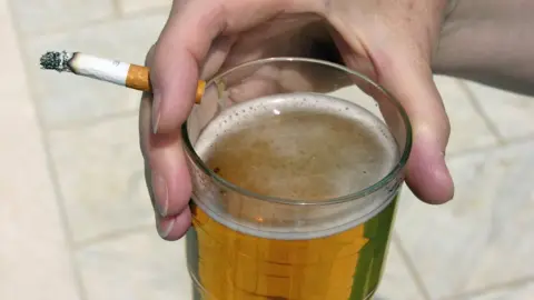 SPL Pint of beer and a cigarette