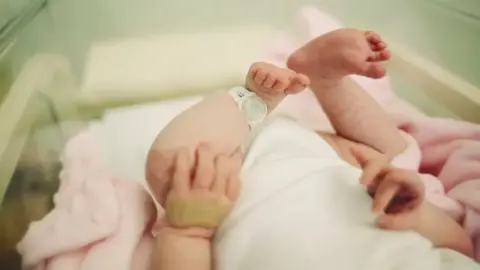 Getty Images Baby in maternity ward