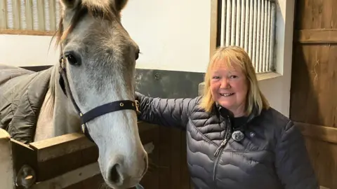 An image of Gwenan Thomas and one of her horses, American Spirit