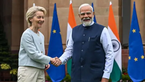 European Commission President Ursula von der Leyen shaking hands with Indian Prime Minister Narendra Modi at Hyderabad House in Delhi, ahead of their extensive discussions
