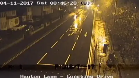 Police handout CCTV of bike entering playing field from the road