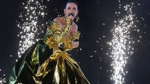 Getty Images Katy Perry performs on stage during the Coronation Concert on May 07, 2023 in Windsor, England.