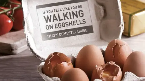 PSNI The message of the PSNI's domestic abuse Christmas campaign: 'If you feel like you're walking on eggshells, that's domestic abuse'.