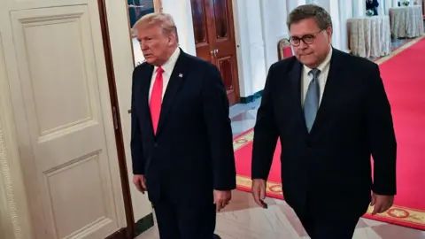 AFP Donald Trump and William Barr give a press conference in December