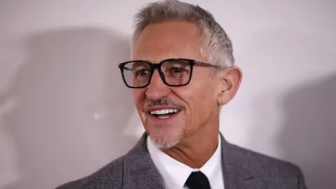 EPA Former British footballer and broadcaster Gary Lineker poses upon arrival at the GQ Men of the Year Awards 2023 at the Royal Opera House in London, Britain, 15 November 2023