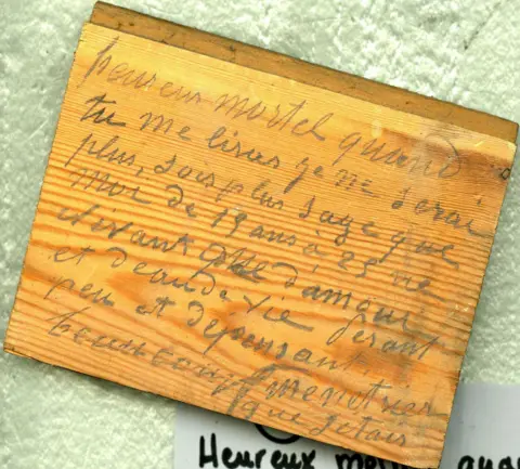 inscription on parquet floor board