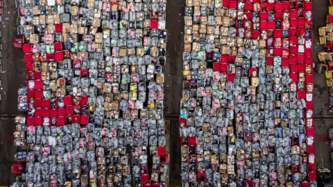 Ben Birchall/PA Parcels outside Royal Mail centre in Bristol