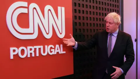 EPA-EFE/REX/Shutterstock Boris Johnson at the CNN summit in Portugal