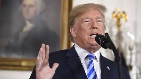 AFP/ Getty Images President Trump in the White House, announcing he will withdraw the US from the nuclear deal with Iran