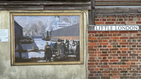 Isle of Wight Council Men of the Docks by George Bellows in place on Sea Street
