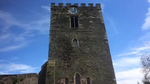 BBC The clock tower at the 12th Century St Mary's Church