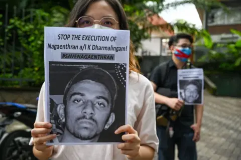 Getty Images People in Singapore and Malaysia protested against Nagaenthran's execution