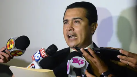 Getty Images Juan Antonio Hernandez speaks with the press upon arrival at the Toncontin international airport from the United States, on October 25, 2016 in Tegucigalpa