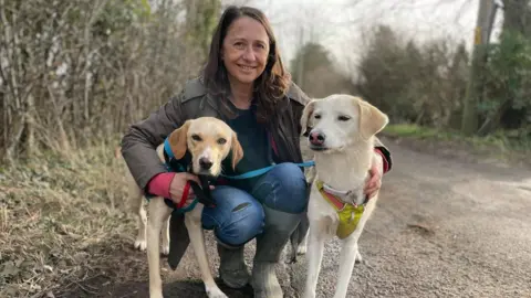 Laura Foster/BBC Sarah Steven with her dogs