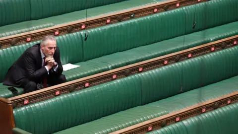 UK Parliament MP sits alone on the benches