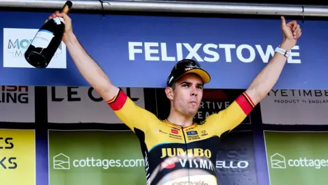 PA Media Wout van Aert of team Jumbo-Visma celebrates after winning stage five of the 2023 Tour of Britain, from Felixstowe to Felixstowe and becoming the overall leader