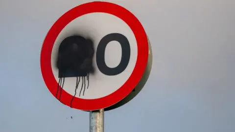 Getty Images A damaged 20mph sign