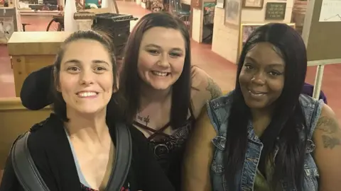 Tasia Smith A picture of Angela Peters with Tasia Smith and Ebony Harris