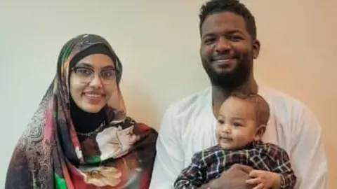 Niam Ali Niam with her husband Mohammed and son Yousif