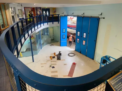 RNLI Henry Blogg Museum showing empty space on ground floor where HF Bailey lifeboat had been 