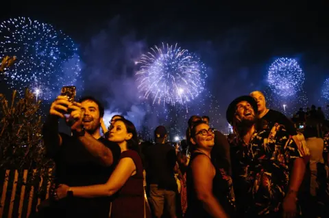 Alba Vigaray/EPA Fireworks explode over the East River as part of an Independence Day celebration in New York, New York, USA, 4 July 2018