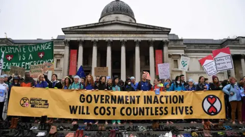 Getty Images Protesters alongside shoes on Trafalgar Square steps