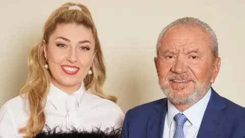 PA Media The Apprentice winner Marnie Swindells with Lord Sugar