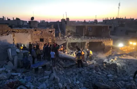 Getty Images White helmets at work in Saraqeb