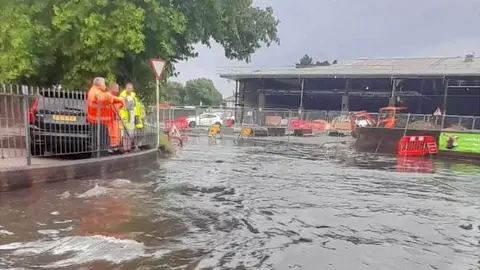 Jo Maria Hunt Flash flooding caused a spill of sewage onto roads and car parks in Totton, Hampshire