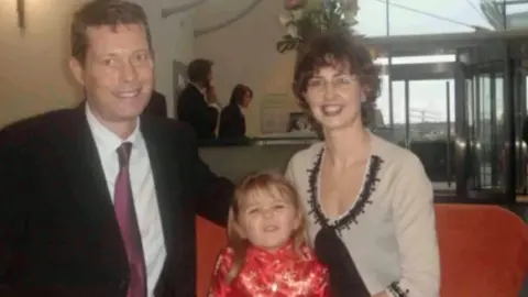 Infected Blood Inquiry Paul and Monica Summers with their daughter