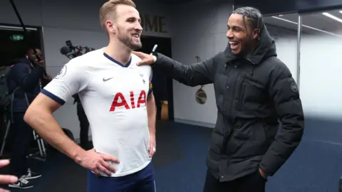 Getty Images AJ Tracey meeting Tottenham's Harry Kane