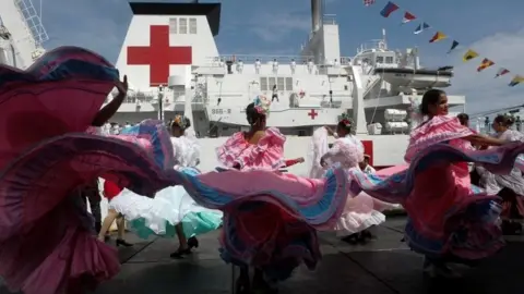 Reuters Members of the Chinese People Liberation Army Navy stand at the hospital ship Peace Ark at the port in La Guaira, Venezuela 22 September 2018