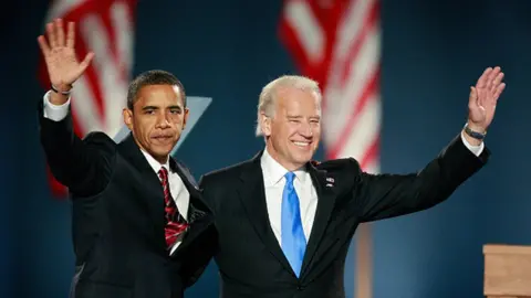 Getty Images Barack Obama and Joe Biden wave to their supporters after Obama gave his victory speech during an election night gathering in Grant Park on November 4, 2008