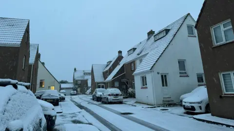 Jersey airport reopens after snow closes runway