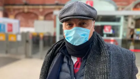 Robby West/BBC Adam Goldsmith