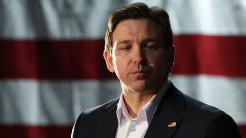 Republican presidential candidate Florida Gov. Ron DeSantis speaks at a campaign event at The Grass Wagon on January 13, 2024 in Council Bluffs, Iowa