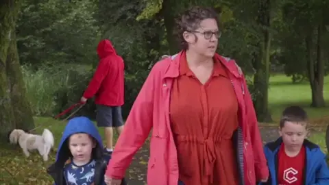 Tenovus Claire with her two young children