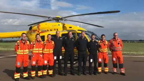 Kensington Palace Prince William and air ambulance medics and crew