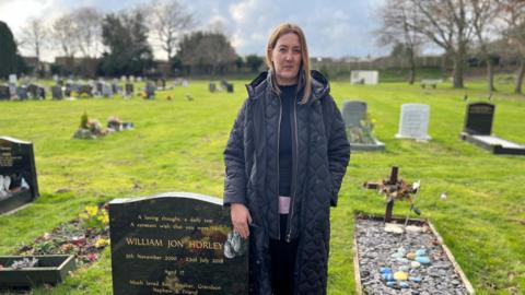 Kim Webster at her son's graveside