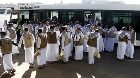 NurPhoto via Getty Images Released Houthi prisoners arrive in Sanaa after being released by the Saudi-led coalition fighting in Yemen (28 November 2019)