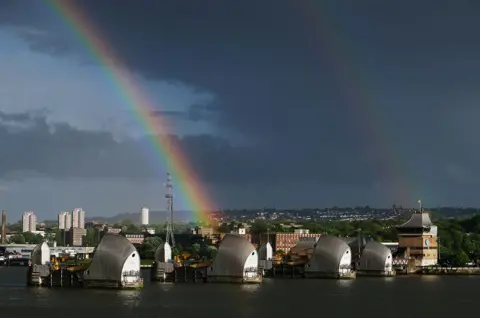 Steven Watt / Reuters Rainbow over London